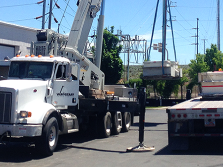 Mining battery being unloaded by a crane